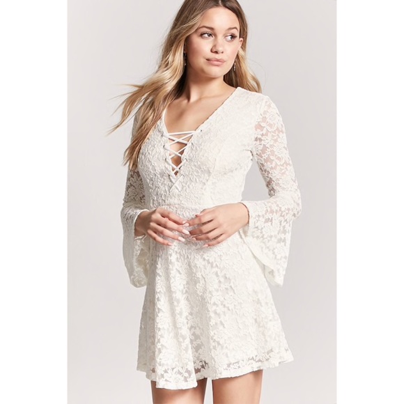 white trumpet sleeve dress